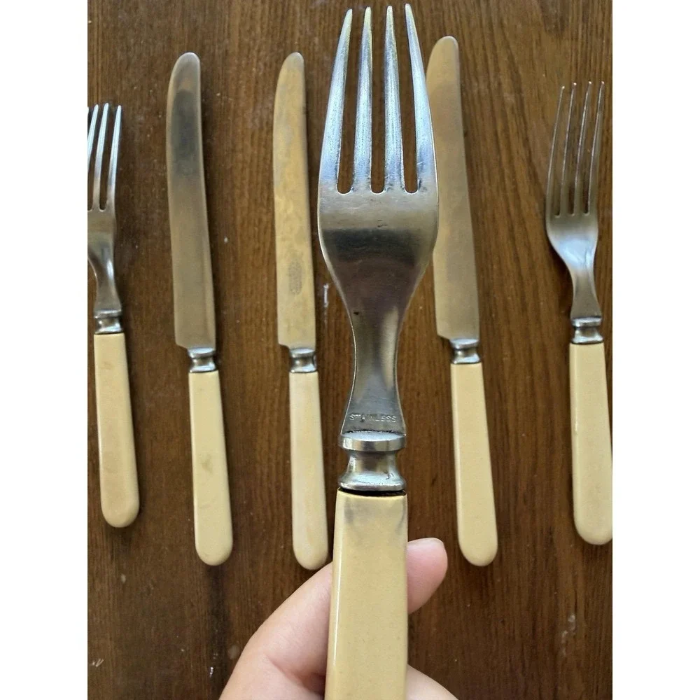 Vintage Universal Resystain Cutlery Set Landers Frary Clark Faux Bone Handle 7pc